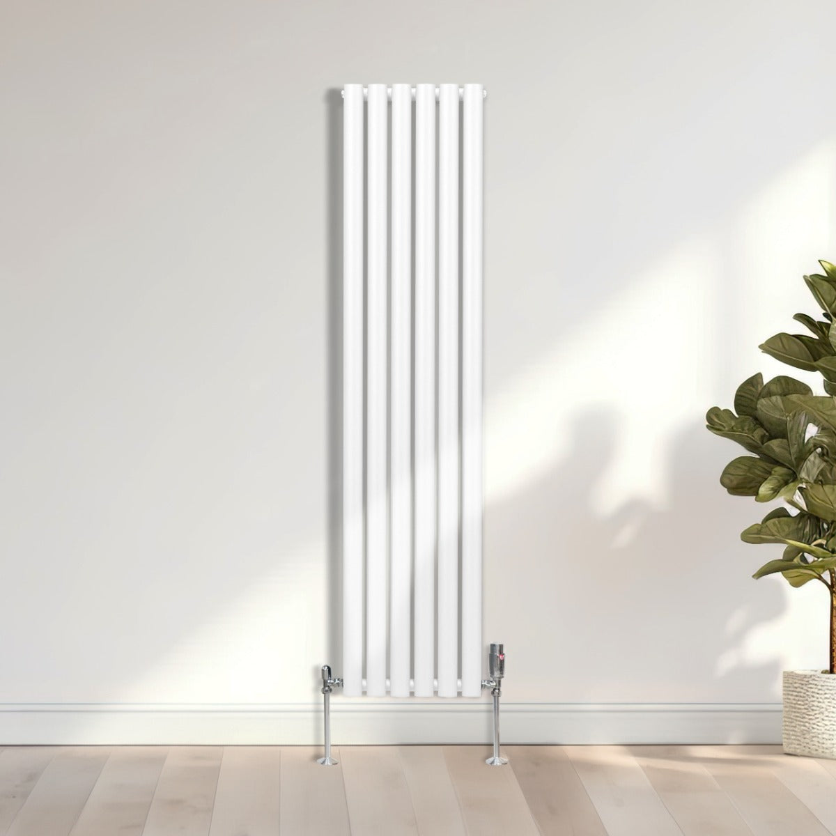 Radiateur à colonnes ovales blanc, 2 panneaux, dimensions 1600 x 360 mm, finition lisse et moderne, installé sur un mur clair