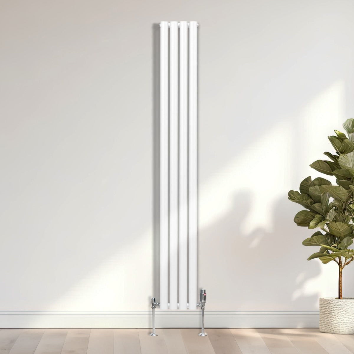 Radiateur à colonnes ovales blanc, 2 panneaux, dimensions 1800 x 240 mm, avec un robinet et un design moderne, installé dans un intérieur lumineux
