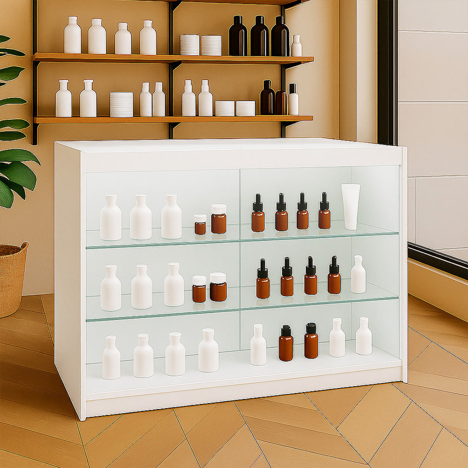 Comptoir de vente à LED blanc, avec étagères en bois, contenant des flacons en verre blanc et marron, éclairage doux et moderne