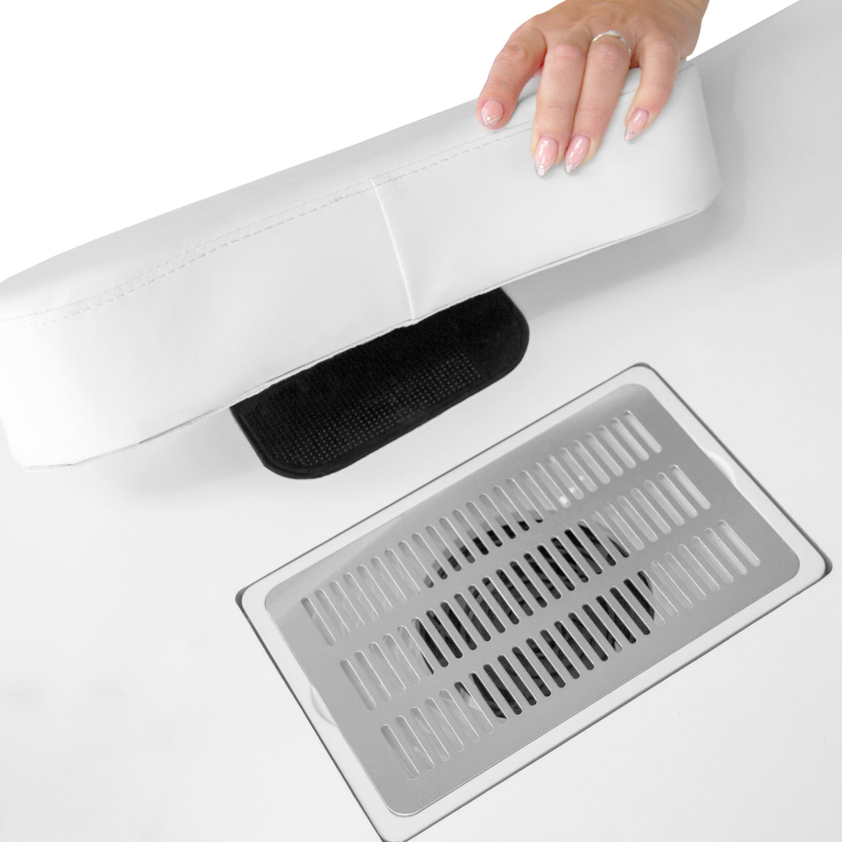 Table de manucure professionnelle avec coussin blanc, grille d'aération noire et surface lisse, idéale pour les soins des ongles