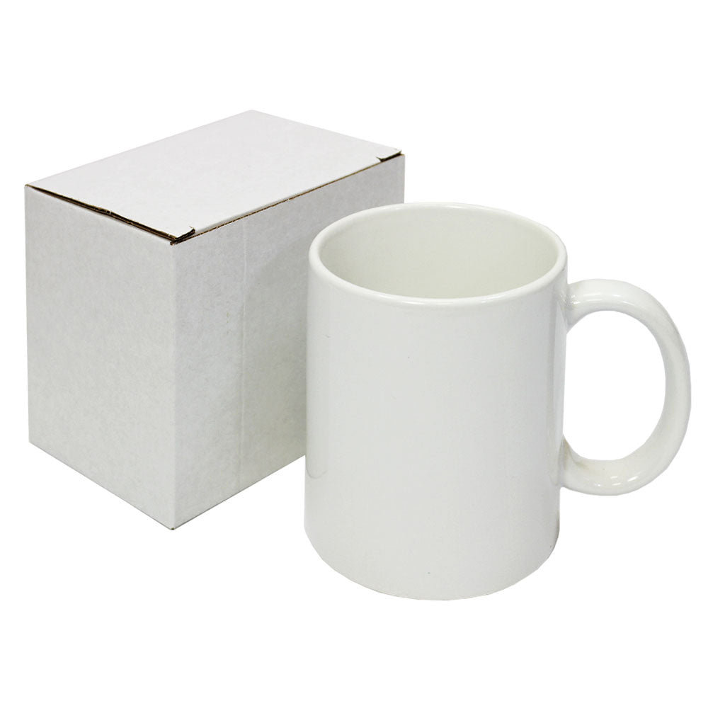 Tasse blanche en céramique avec une poignée, accompagnée d'une boîte en carton, idéale pour la sublimation et la personnalisation