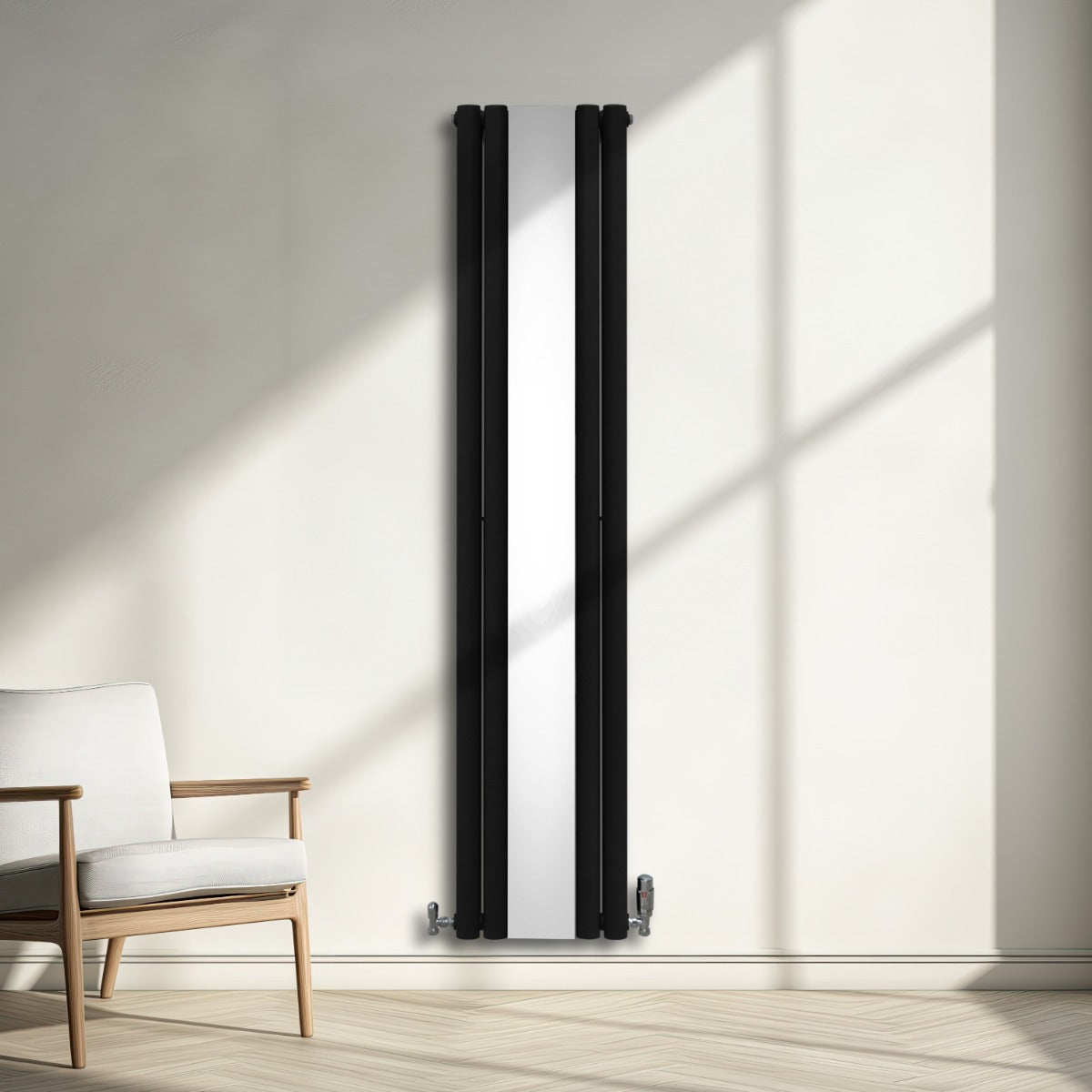 Radiateur à colonnes ovales noir avec miroir, design moderne et élégant, installé sur un mur lumineux, entouré d'un mobilier minimaliste