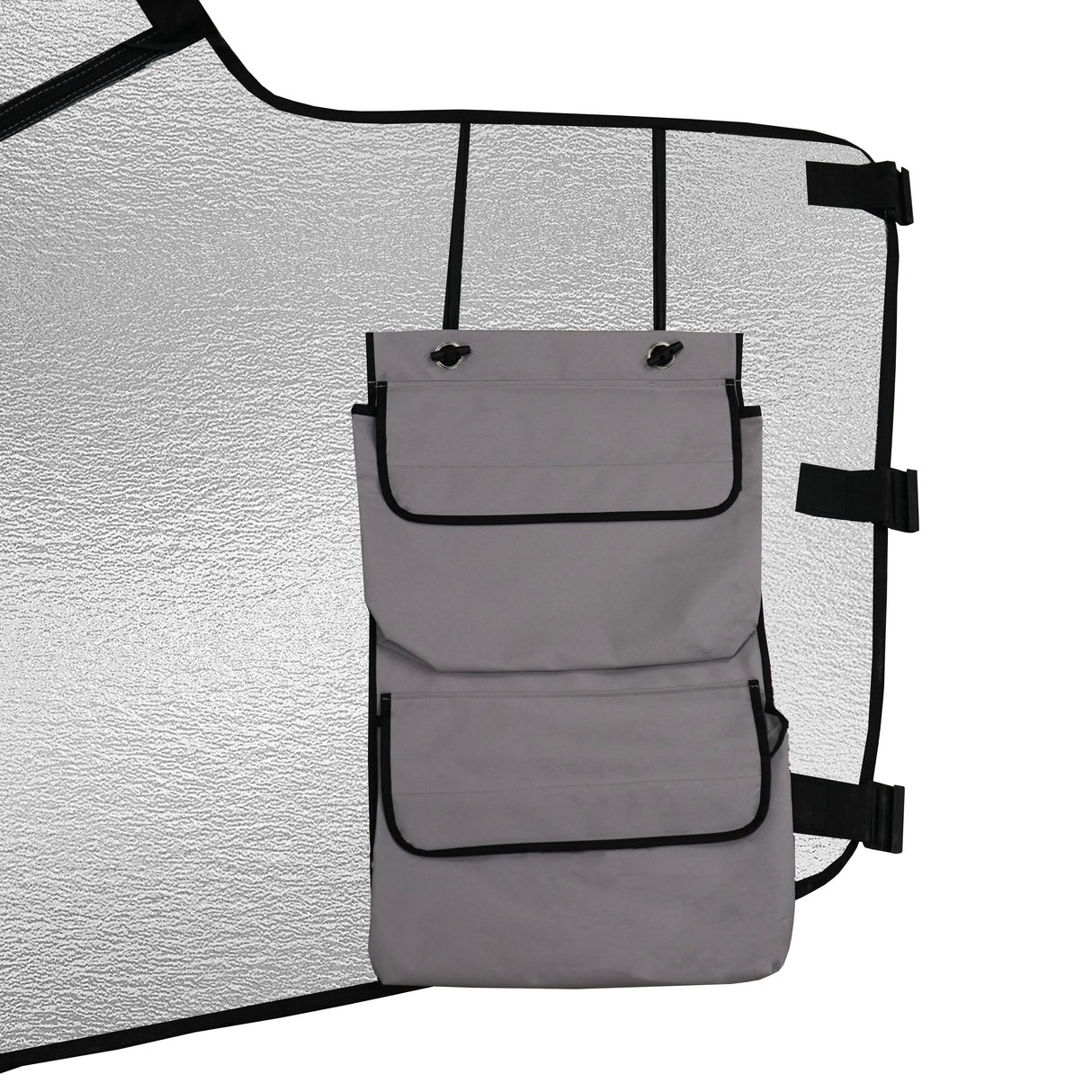 Couverture pare-soleil pour camping-car en argent avec poches grises, texture réfléchissante et attaches noires pour un maintien sécurisé