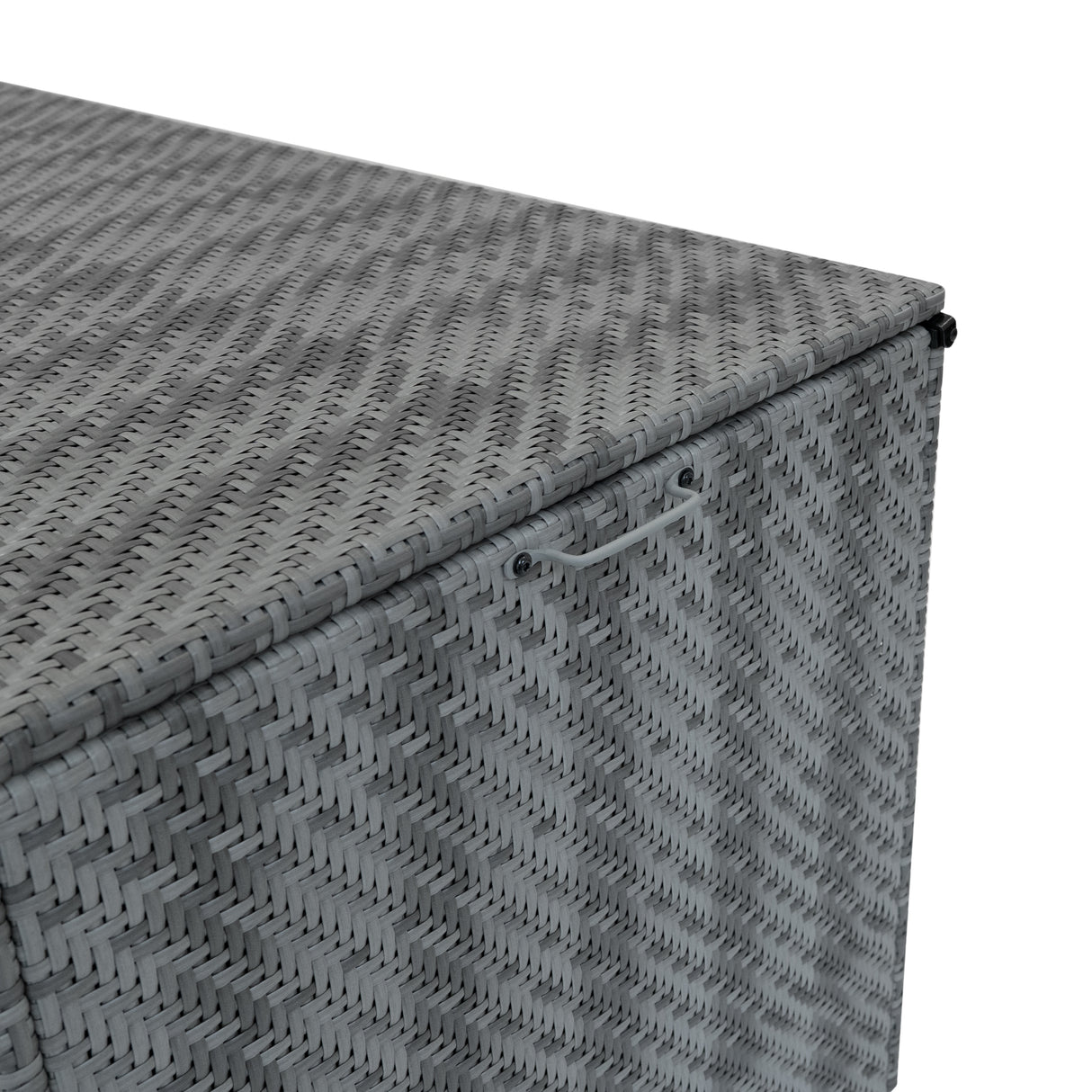 Coffre de rangement en rotin gris, texture tissée, avec poignée pour un accès facile, idéal pour le mobilier de jardin modulaire