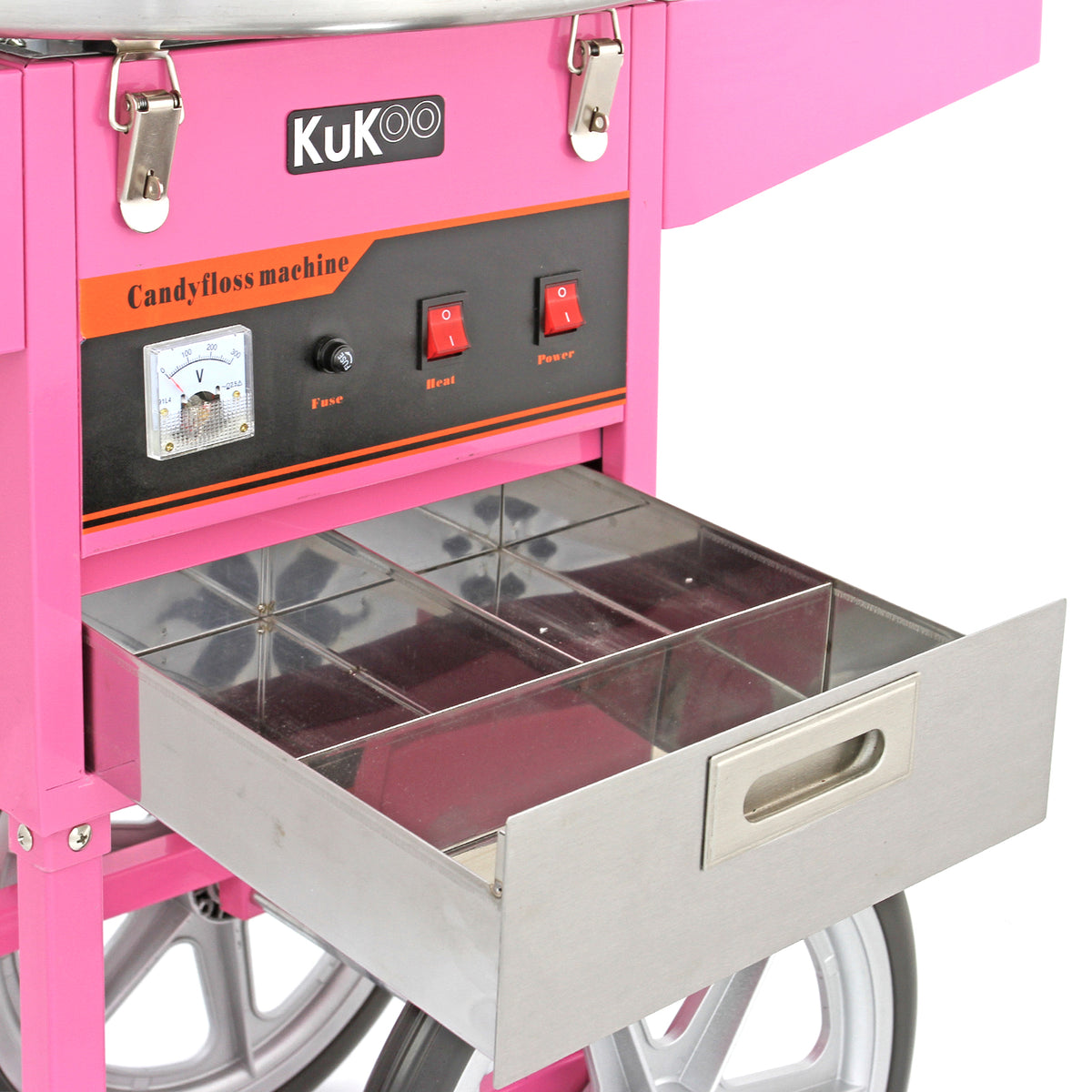 Machine à barbe à papa rose vif avec tiroir en métal argenté, boutons de contrôle rouge et cadran de puissance sur le devant