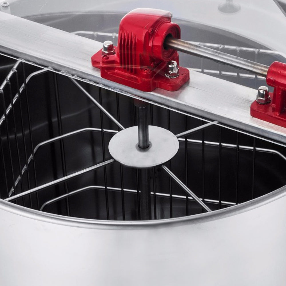 Extracteur de miel manuel T-Mech en acier inoxydable, avec un moteur rouge et un tambour à alvéoles pour une extraction efficace du miel