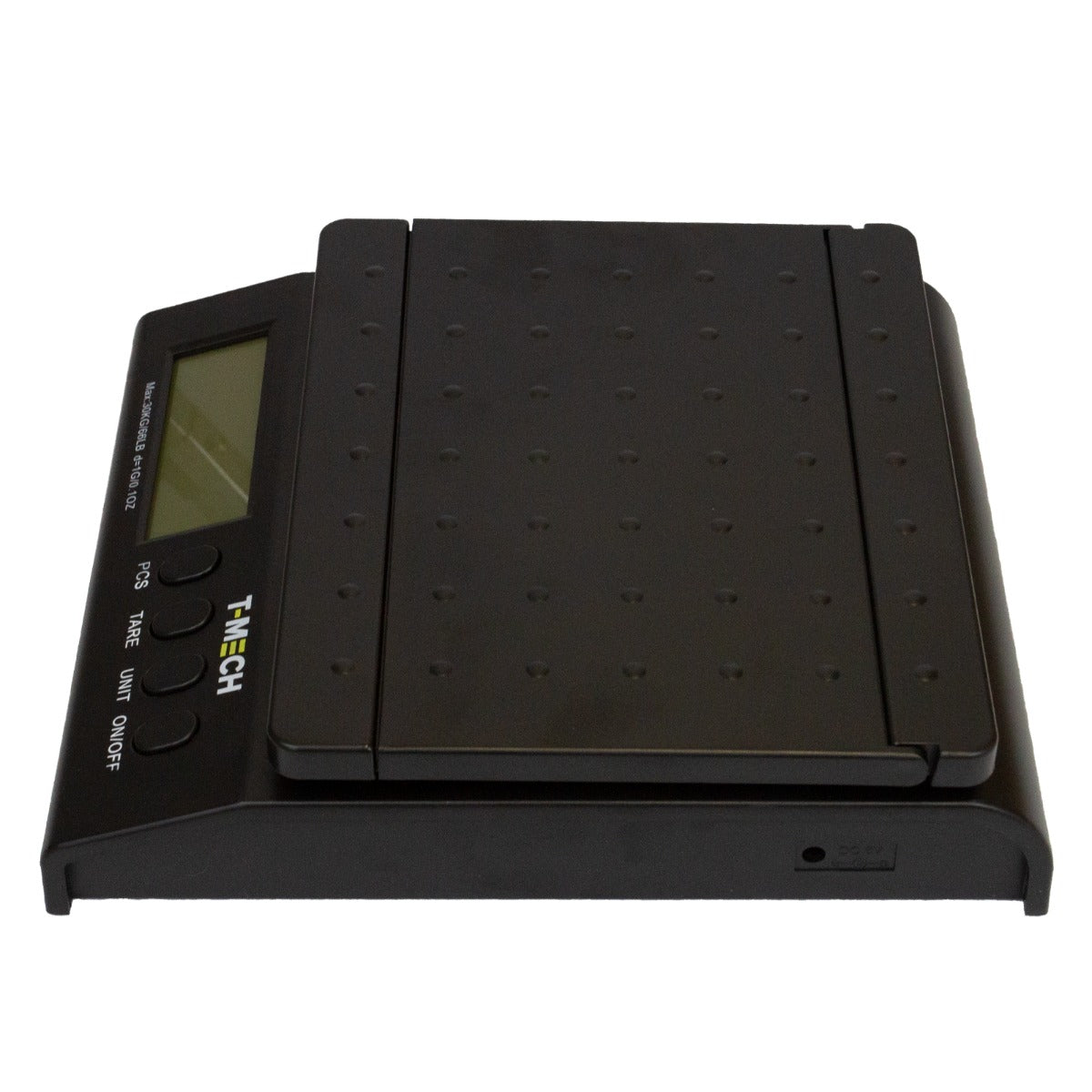Balance postale T-Mech en noir, avec un écran LCD clair, surface texturée pour une meilleure adhérence et précision de pesée