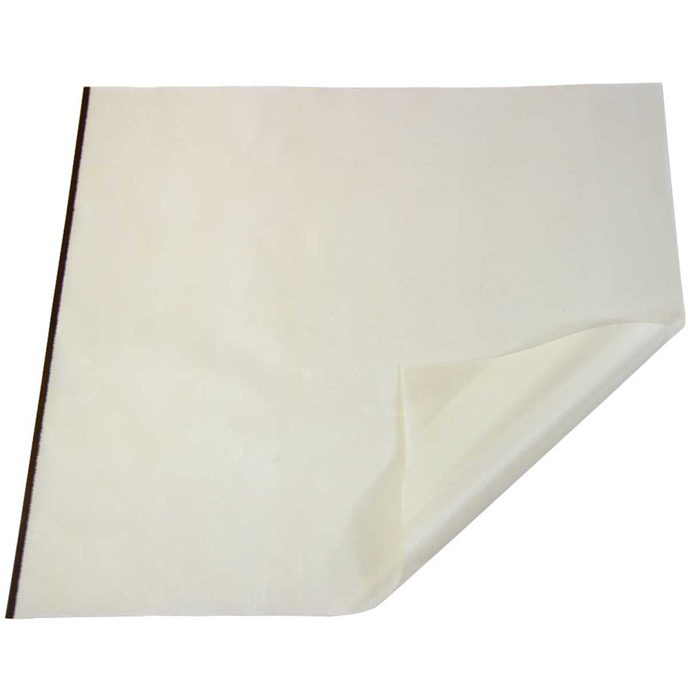 Tissu de sublimation beige clair, souple et lisse, plié avec un bord brun, idéal pour des impressions de haute qualité