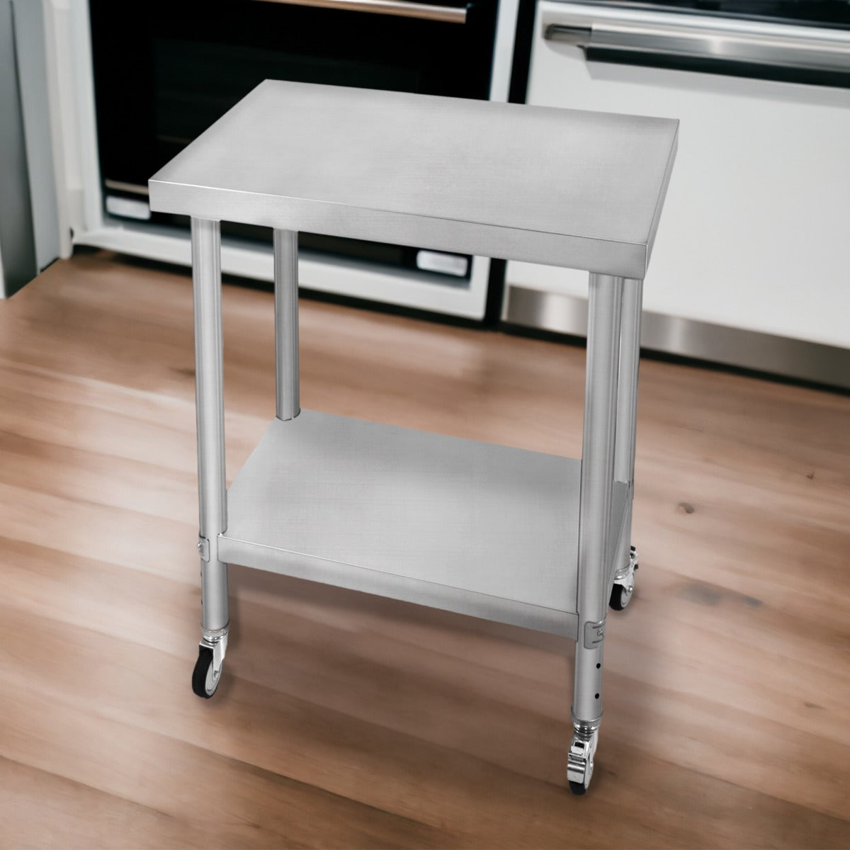 Plan de travail en inox, 60 x 45 x 86 cm, surface lisse, structure robuste avec roulettes pour mobilité, idéal pour la cuisine