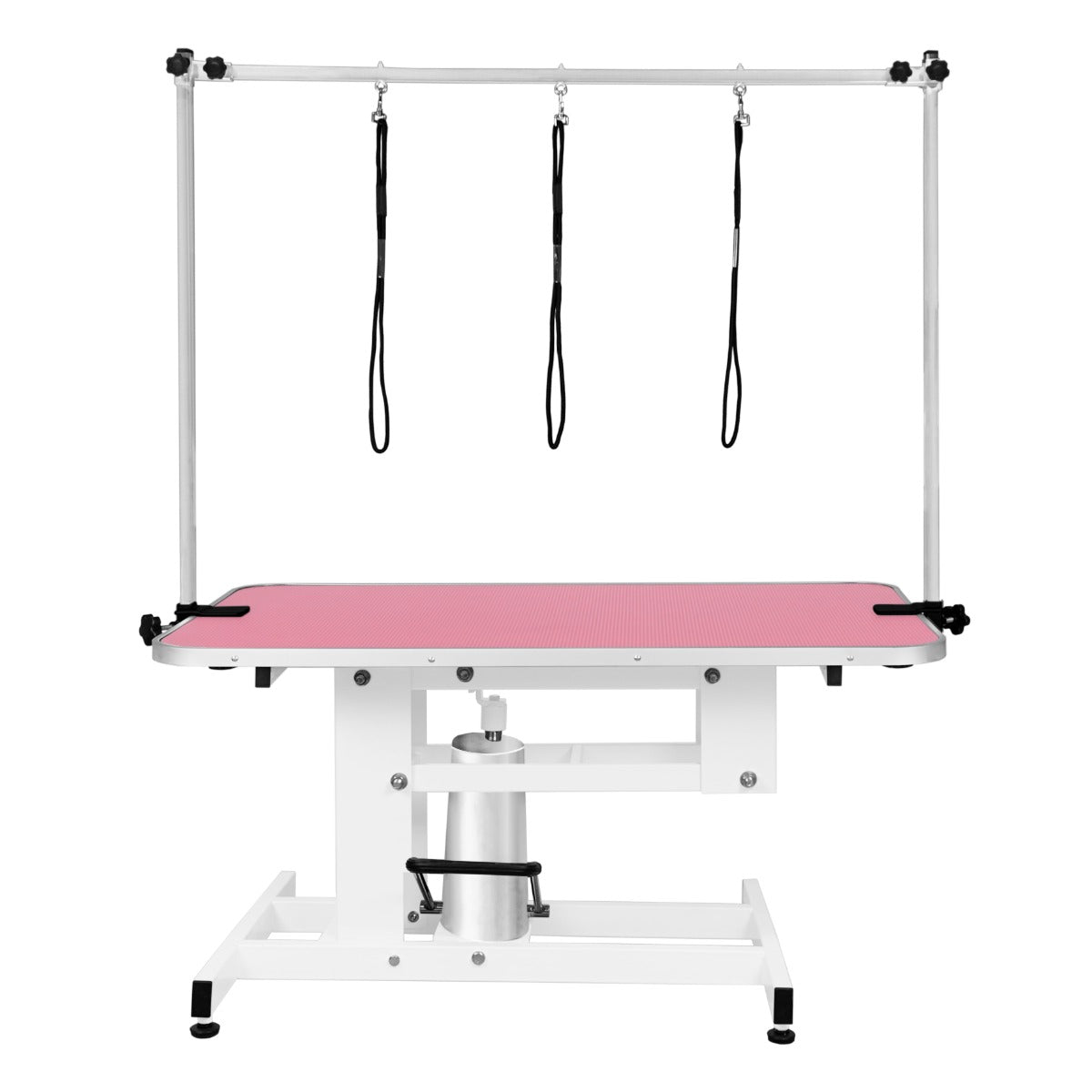 Table de toilettage hydraulique blanche avec plateau rose texturé, équipée de trois sangles noires pour maintenir les animaux en place