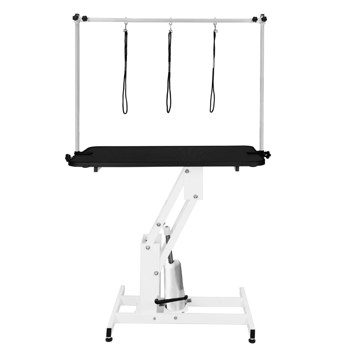 Table de toilettage hydraulique blanche avec plateau noir, équipée de trois sangles suspendues pour maintenir les animaux en place
