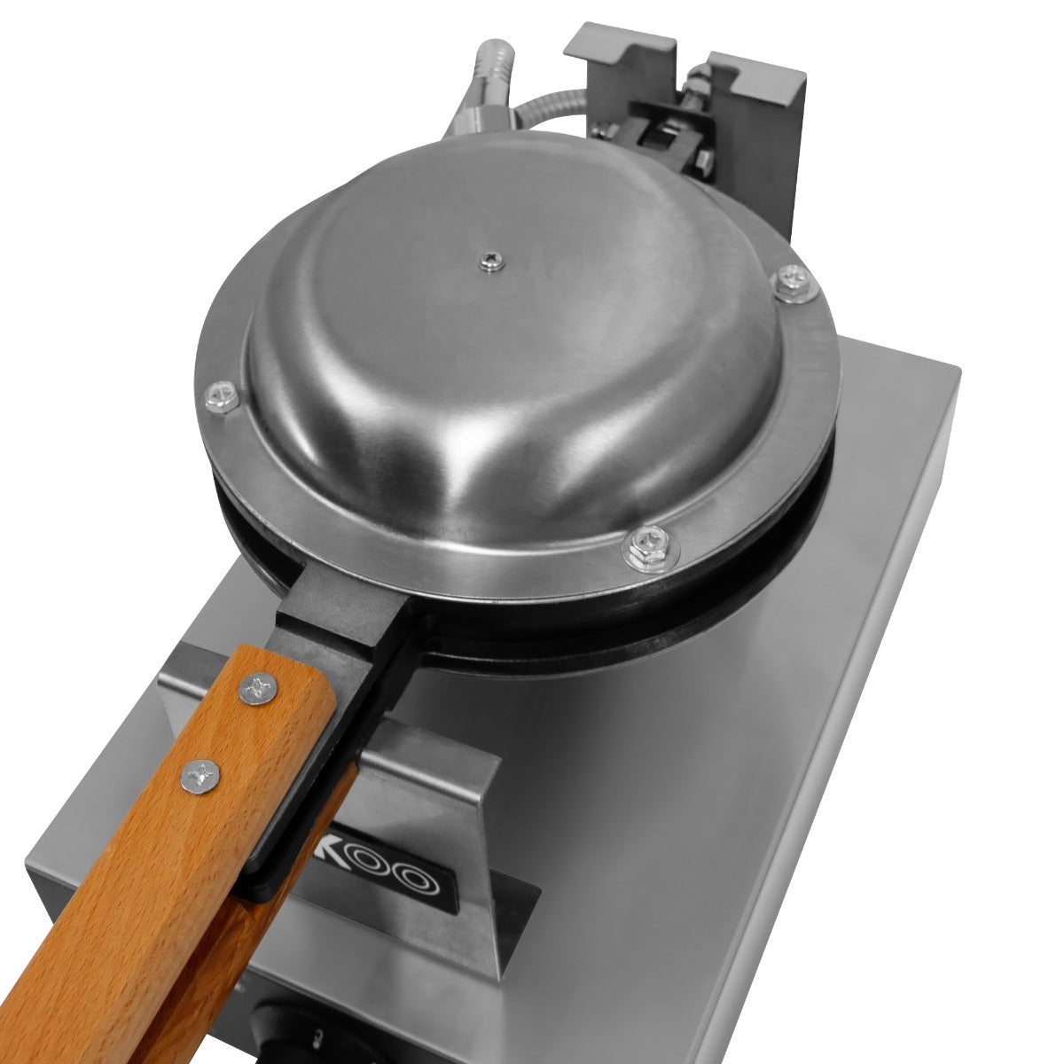 Gaufrier KuKoo en acier inoxydable avec poignée en bois, conçu pour préparer des croque-monsieur croustillants et dorés