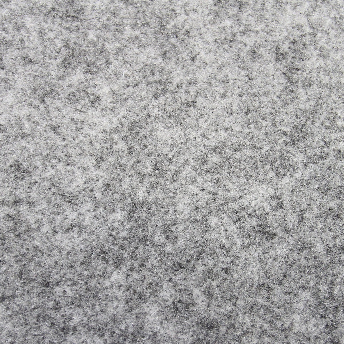 Doublure intérieure en feutre gris clair, texture douce et uniforme, idéale pour l'isolation et le rangement dans un Berlingo