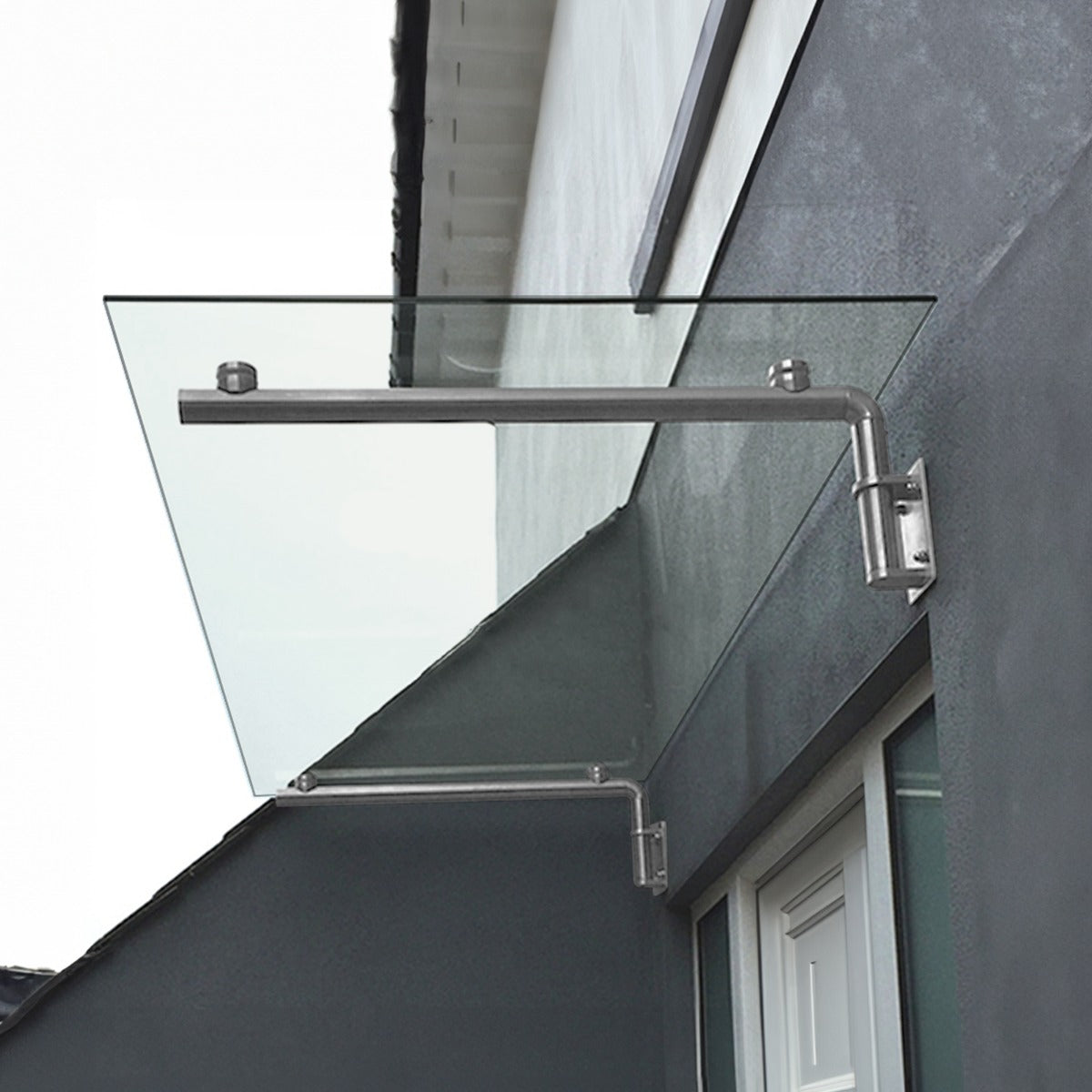 Auvent en verre transparent de 144 cm x 80 cm, fixé avec des supports en acier inoxydable, ajoutant une touche moderne à l'entrée