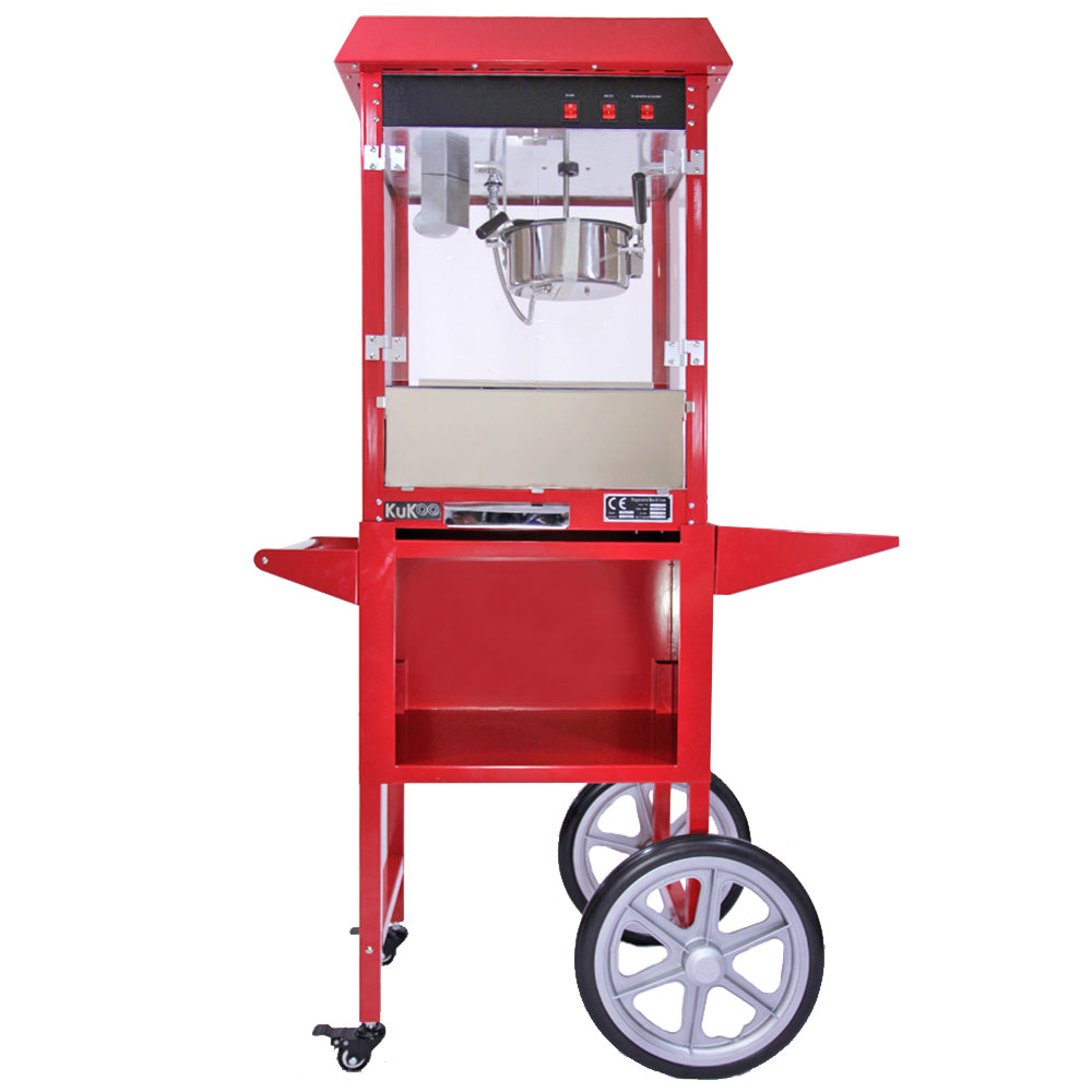 Machine à popcorn en inox rouge avec chariot, design vintage, cuve en métal brillant et roues blanches pour un transport facile