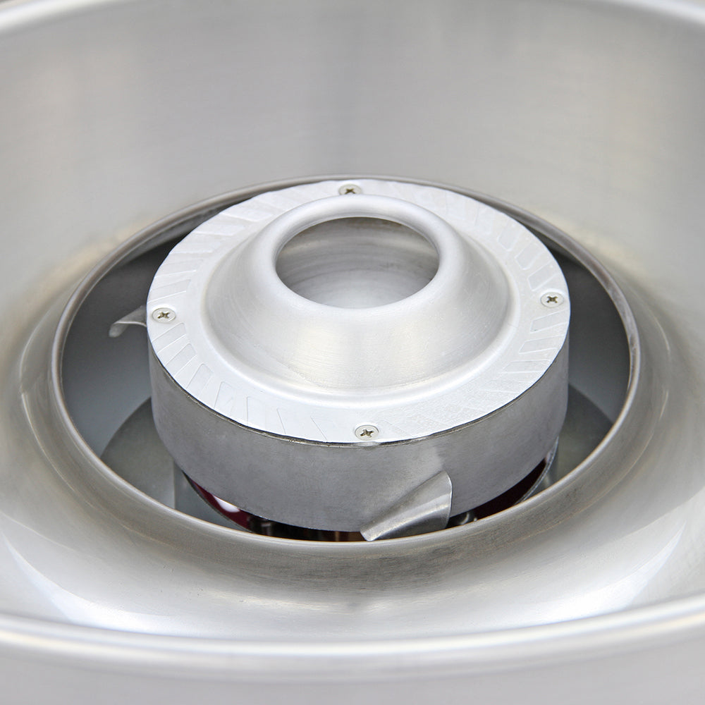 Machine à barbe à papa en acier inoxydable, avec un bol brillant et un mécanisme central pour créer des fils de sucre légers et aérés