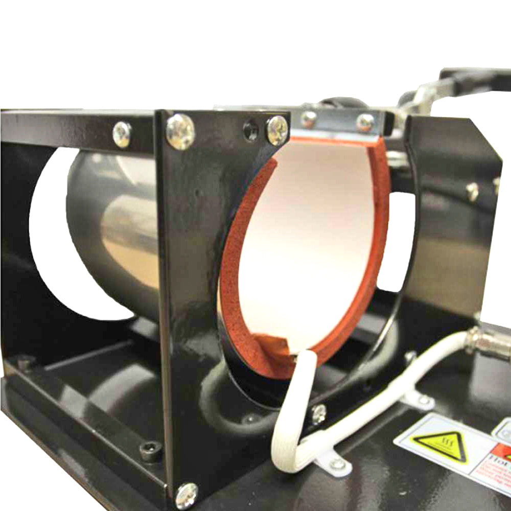 Presse à chaud PixMax pour tasses, avec un cylindre en métal noir, intérieur en silicone rouge, et câblage visible pour le chauffage