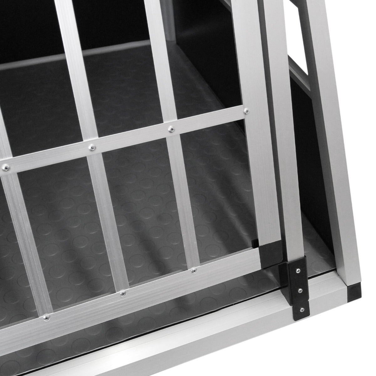 Cage de transport pour animaux petit format en métal argenté, avec des barres de sécurité et un sol texturé antidérapant