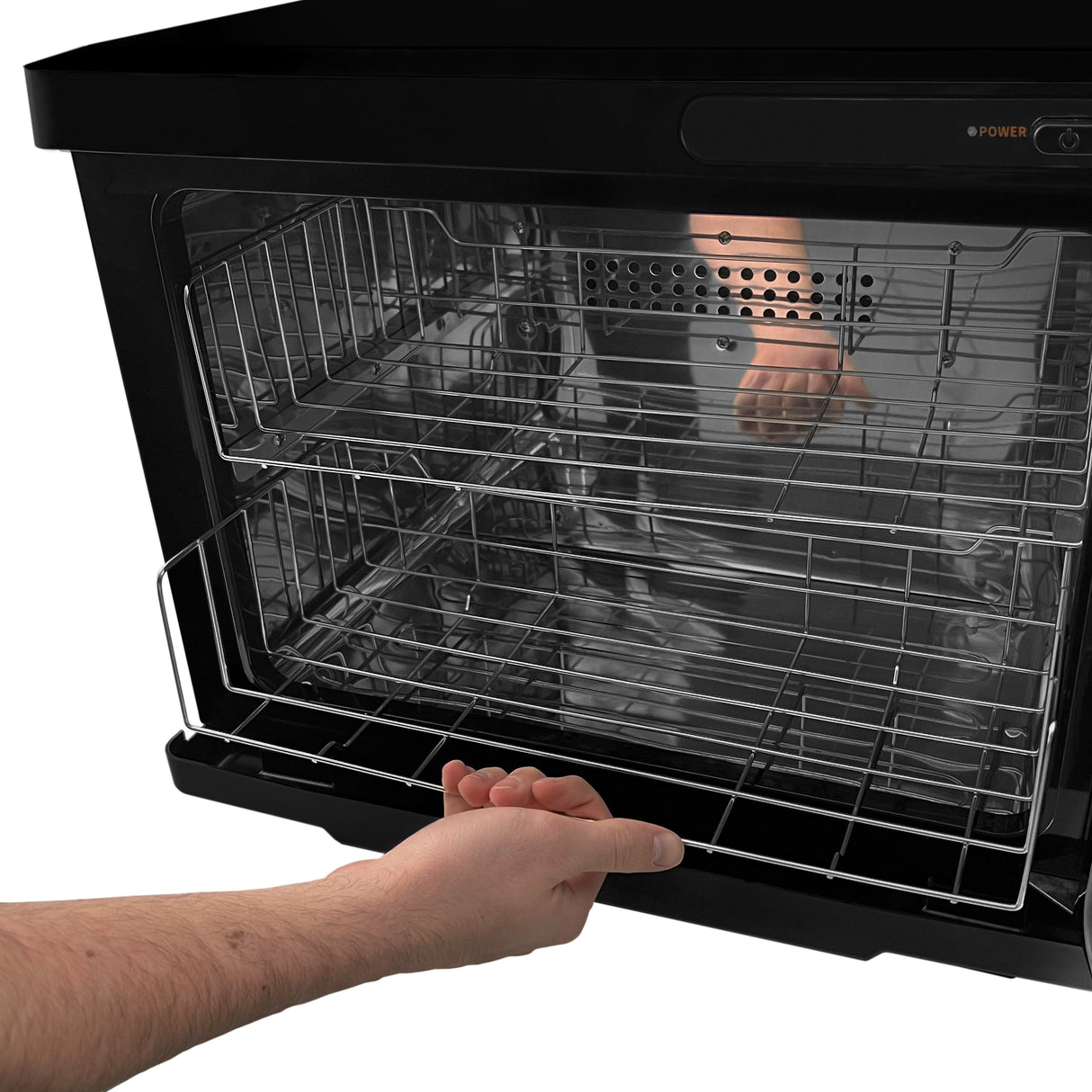Chauffe-serviettes noir de 23 L avec des grilles en métal, offrant un accès facile grâce à une porte en verre transparent et une finition élégante