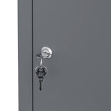 Boîte à colis anti-vol grise avec serrure, clé insérée, surface lisse et finition moderne, idéale pour la sécurité des livraisons