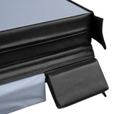 Matelas en mousse noir avec une housse grise, texture lisse et coutures renforcées, idéal pour le confort et le soutien