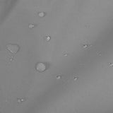 Tissu gris de la tente de Rangelent Moto Moyenne avec gouttes d'eau, montrant sa résistance à l'eau et sa texture durable