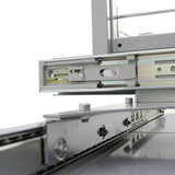 Paniers coulissants métalliques d'angle, finition argentée, avec glissières robustes et design moderne pour un rangement optimal