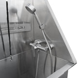 Baignoire de toilettage en inox avec robinetterie moderne, douchette ergonomique et finition brillante, idéale pour le toilettage des animaux