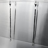 Câbles de maintien en nylon noir fixés à une baignoire de toilettage en inox, offrant robustesse et sécurité pour le bain des animaux