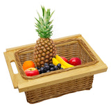 Paniers coulissants en pin, tressés, remplis de fruits colorés comme ananas, oranges, pommes et bananes, avec poignées en bois