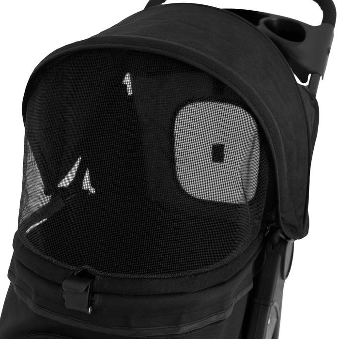 Capote de poussette noire avec filet respirant, offrant une protection contre le soleil tout en permettant une circulation d'air optimale