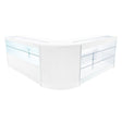 Comptoir de vente à LED en blanc, design moderne avec surfaces lisses, vitrines en verre transparent et éclairage intégré