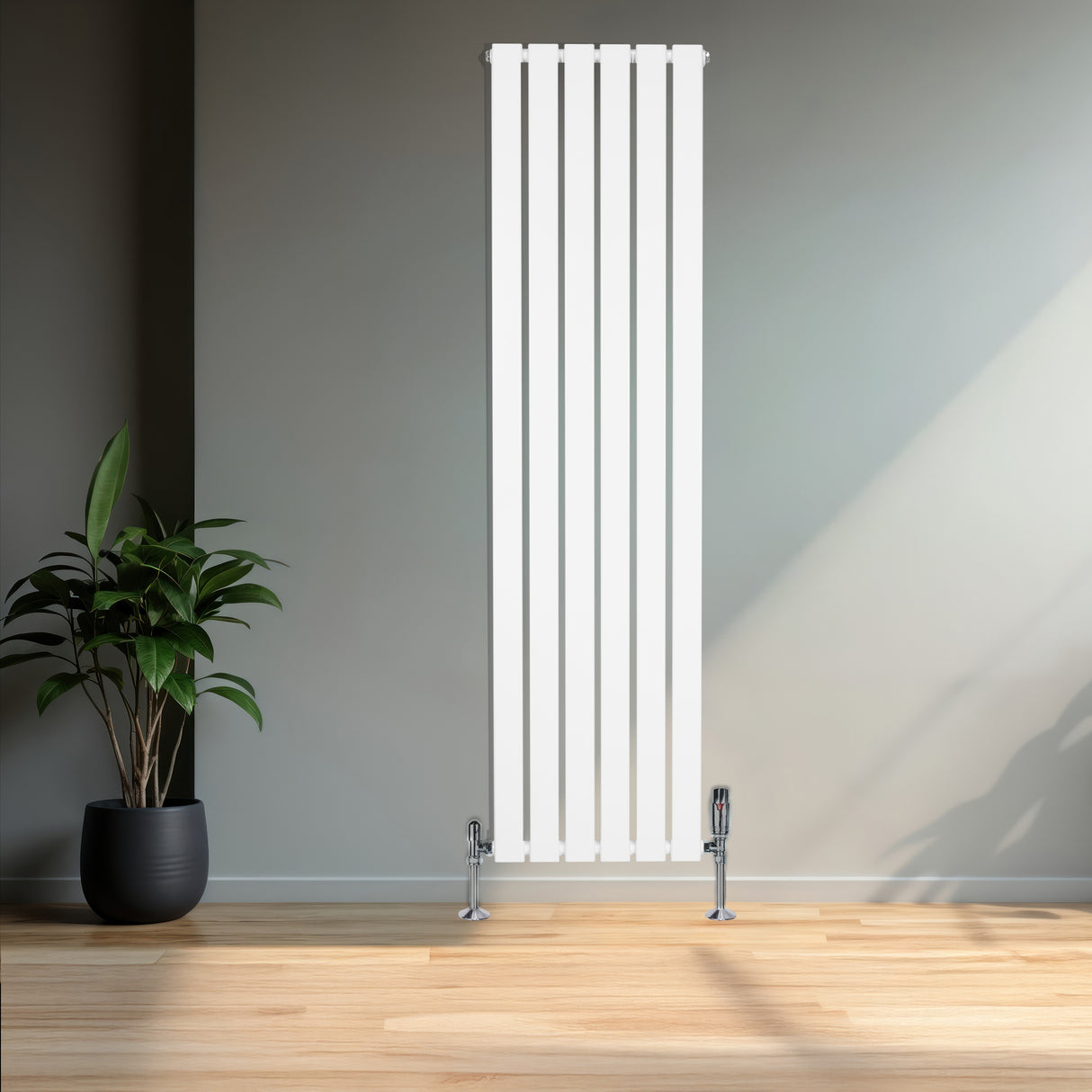 Radiateur plat blanc à un panneau, dimensions 1600 x 420 mm, avec vannes chromées, installé dans un intérieur moderne et lumineux