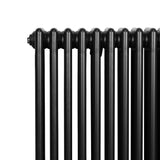Radiateur traditionnel noir à 4 colonnes, 600 x 1190 mm, avec une finition lisse et brillante, offrant une chaleur élégante et efficace