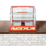 Vitrine chauffe-plats électrique de 60 cm, avec structure en verre transparent, étagères en métal et base rouge décorée de plats colorés
