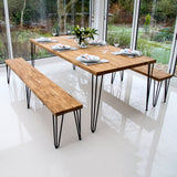Pieds de table noirs en métal de 71 cm, avec deux tiges de 12 mm, soutenant une table en bois clair et bancs assortis