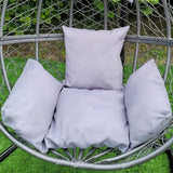 Chaise suspendue en rotin gris avec coussins moelleux, design moderne et élégant, parfaite pour un coin détente extérieur